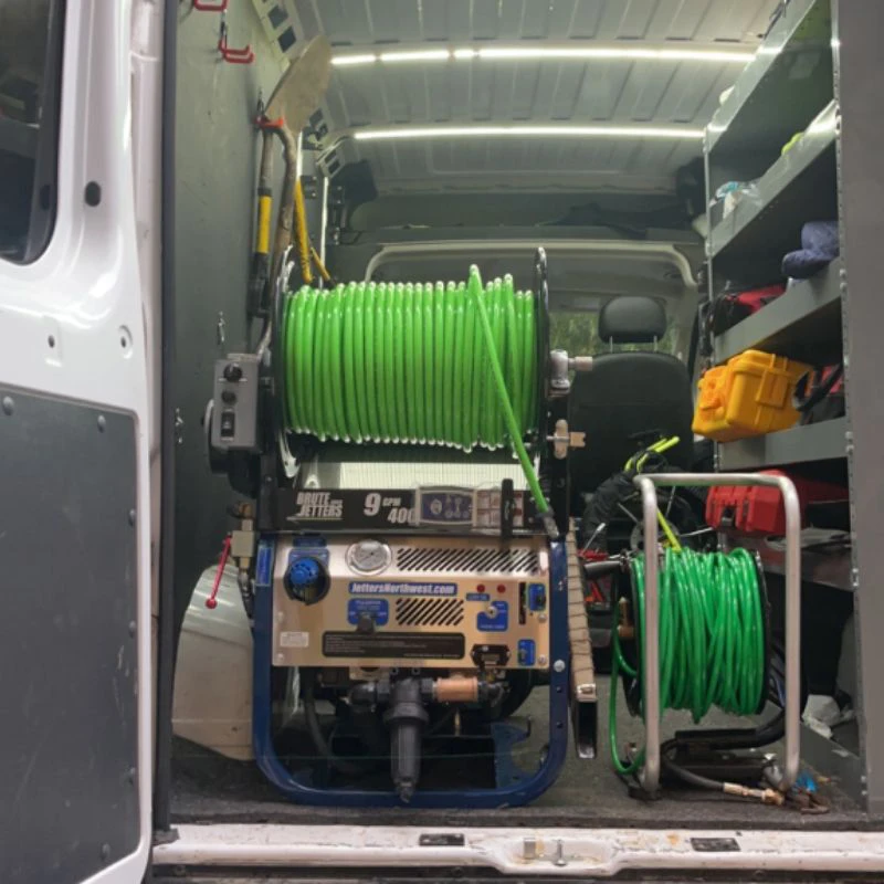 Clear Drains LLC work van filled with modern drain cleaning tools and equipment